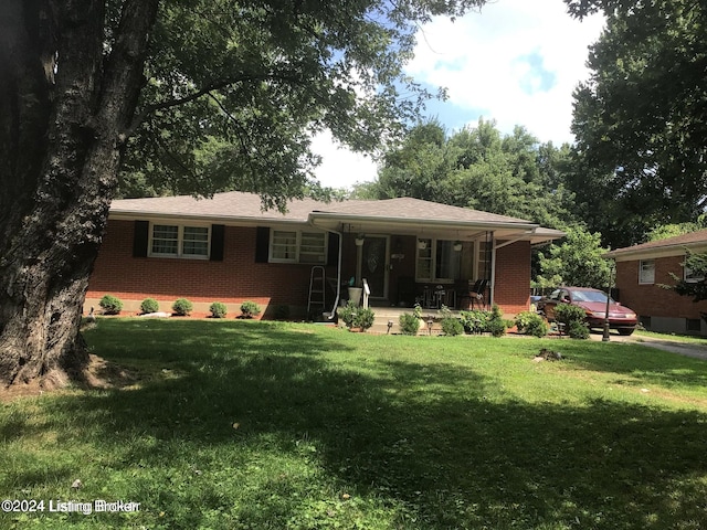 single story home with a front yard