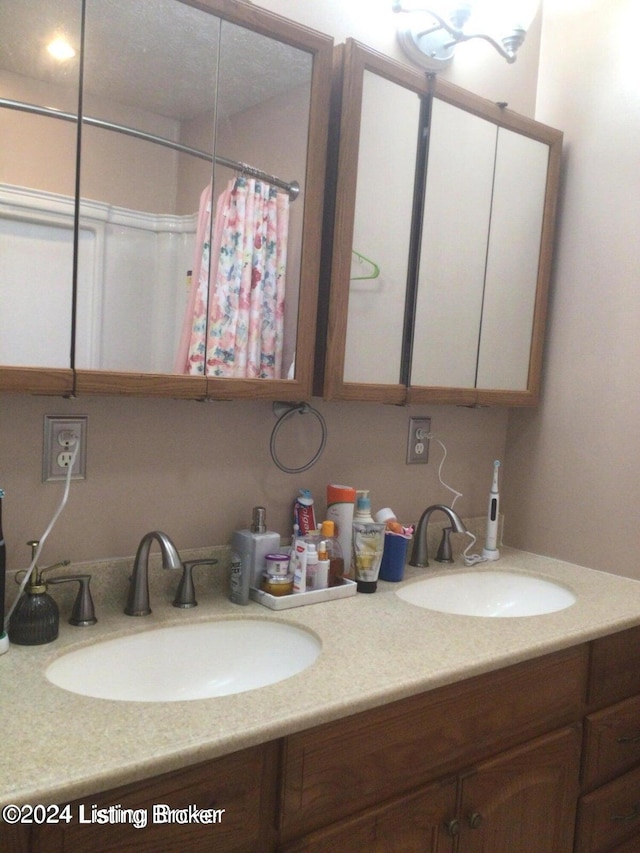 bathroom with double sink vanity