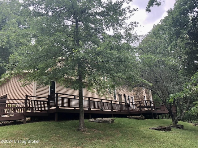 exterior space featuring a yard and a deck