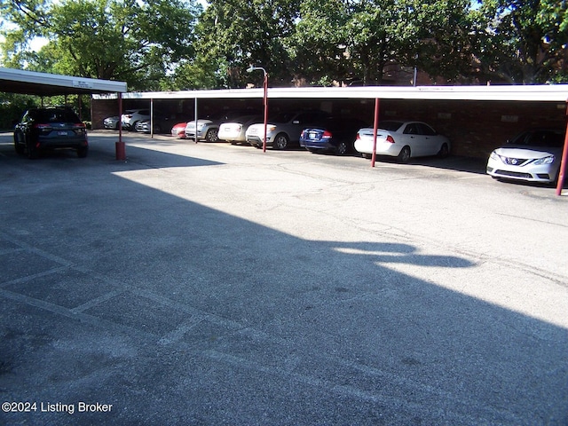 view of parking featuring a carport