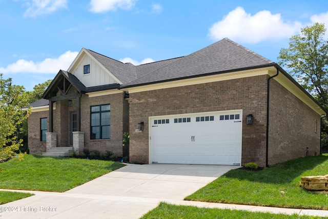 craftsman house with a front lawn and a garage