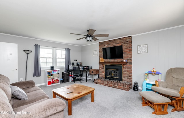 carpeted living room featuring ceiling fan, brick wall, ornamental molding, and a brick fireplace