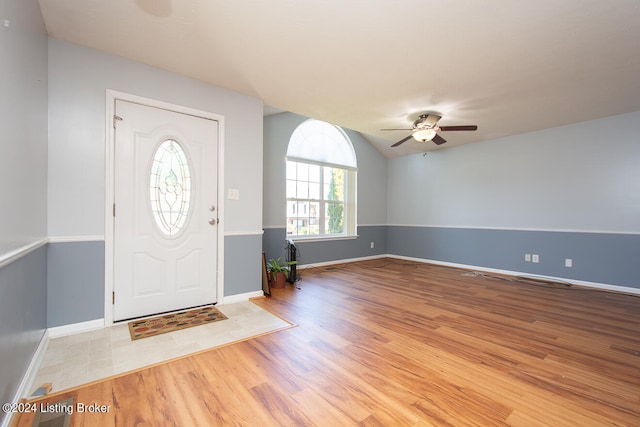 entryway with ceiling fan and light hardwood / wood-style flooring