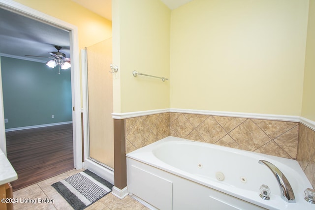 bathroom with ceiling fan, shower with separate bathtub, crown molding, and hardwood / wood-style floors