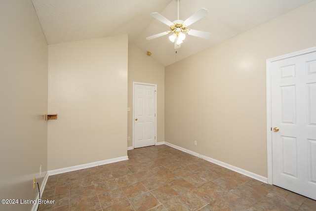 unfurnished bedroom featuring ceiling fan and lofted ceiling