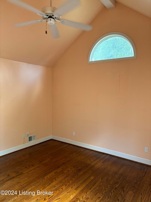 additional living space with ceiling fan, wood-type flooring, and lofted ceiling with beams