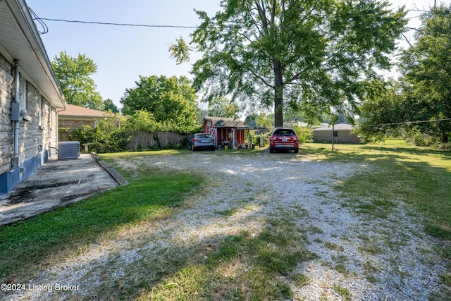 view of yard with central AC