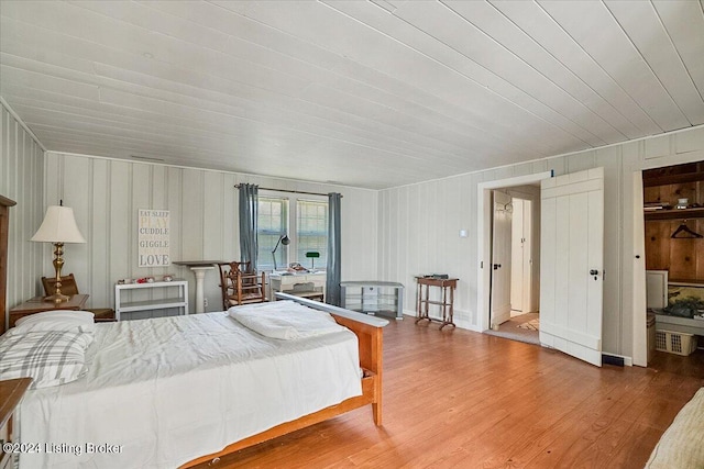 bedroom with hardwood / wood-style floors