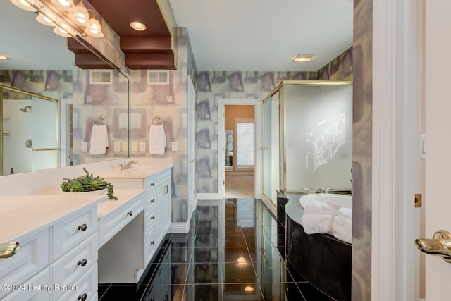 bathroom with tile patterned floors, vanity, and a shower with shower door