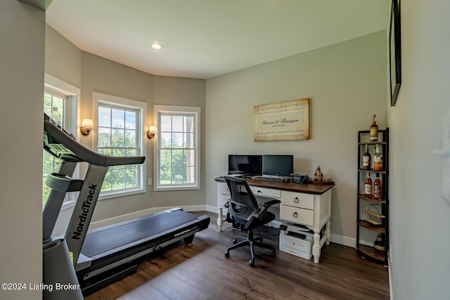 office space featuring dark wood-type flooring, recessed lighting, and baseboards