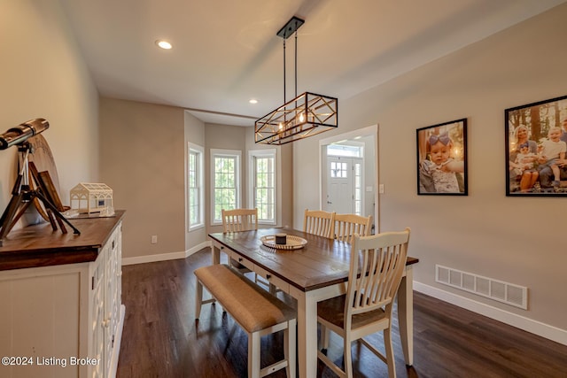 dining area featuring dark wood-style floors, recessed lighting, visible vents, and baseboards