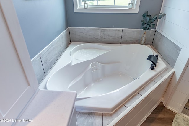 bathroom with a tub