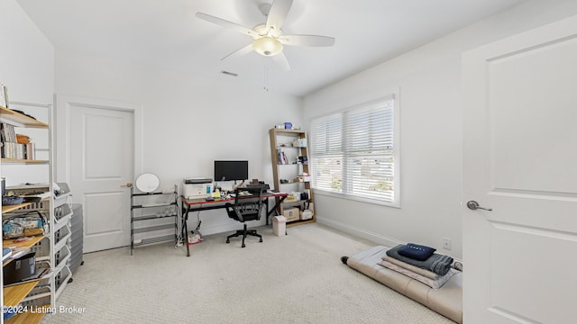 home office with carpet flooring and ceiling fan