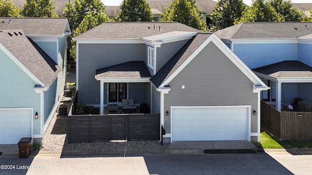 view of front of property with a garage