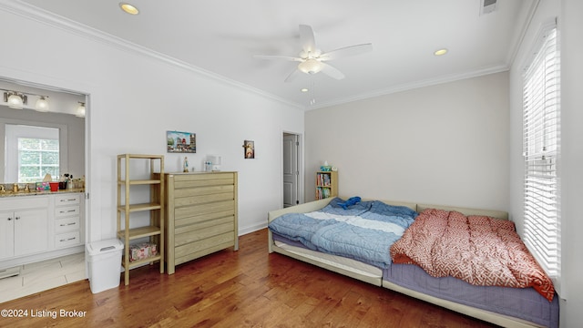 bedroom featuring crown molding, dark wood-type flooring, sink, and ceiling fan