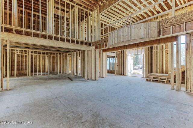 miscellaneous room featuring a high ceiling