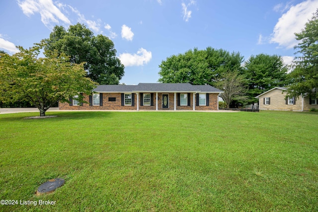 ranch-style home with a front yard