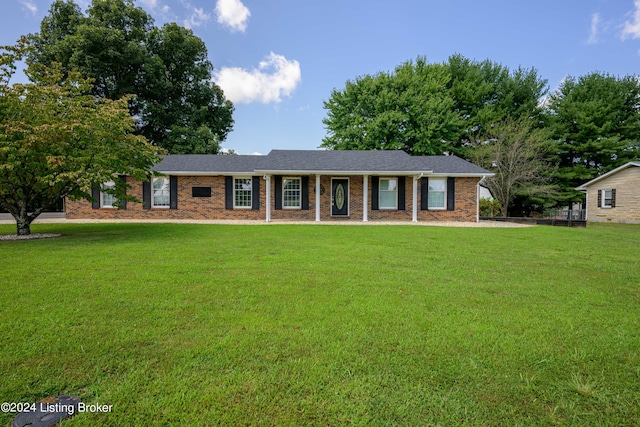 ranch-style home with a front yard