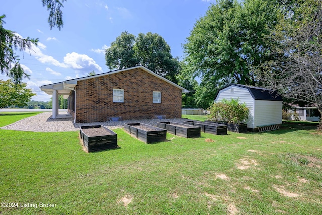 exterior space with a yard and a shed