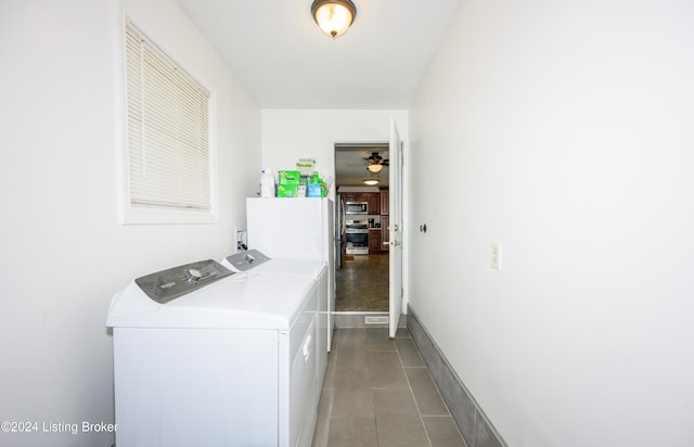 laundry area featuring ceiling fan, washing machine and clothes dryer, and light tile patterned floors