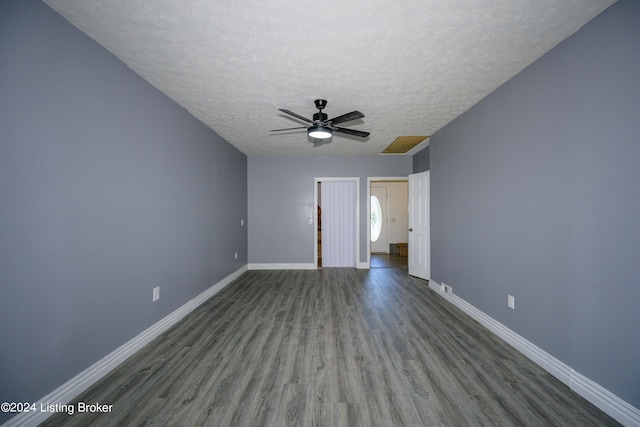 unfurnished bedroom featuring a textured ceiling, ceiling fan, and hardwood / wood-style floors