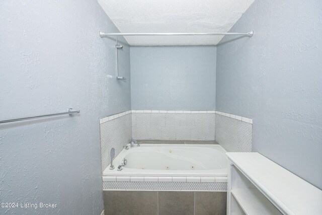 bathroom featuring a textured ceiling