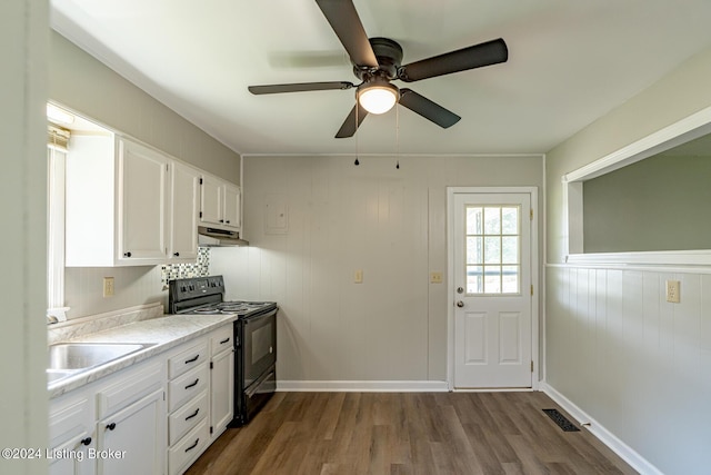 kitchen featuring white cabinetry, sink, ceiling fan, dark wood-type flooring, and black range with electric cooktop