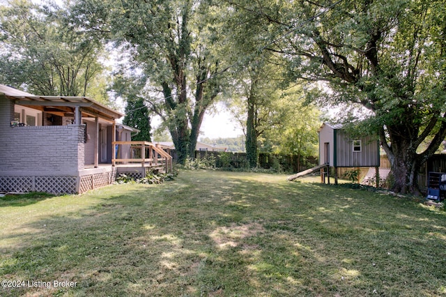 view of yard featuring a deck