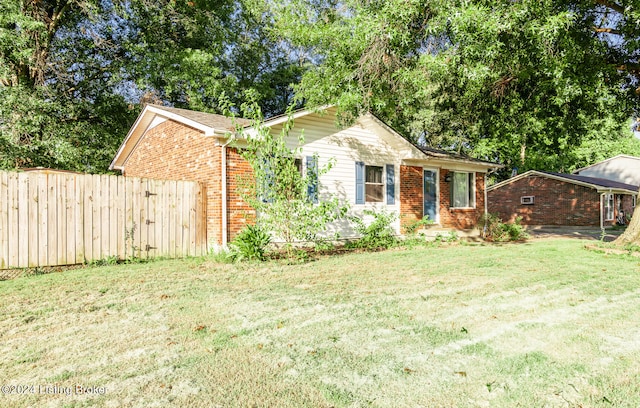 view of front of property with a front lawn