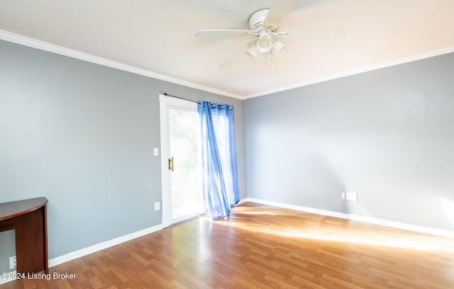 unfurnished room featuring ceiling fan, crown molding, and wood-type flooring