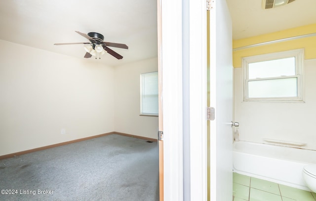 interior space with plenty of natural light and ceiling fan