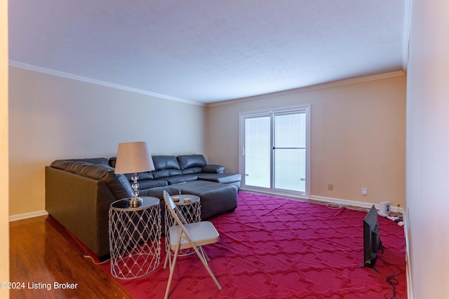 living room with ornamental molding and hardwood / wood-style flooring