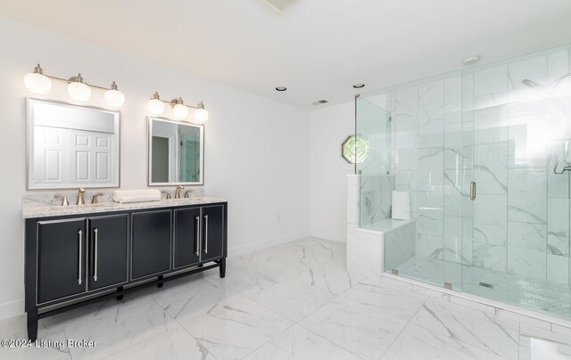 bathroom featuring vanity and an enclosed shower