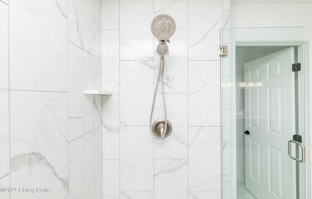 bathroom featuring an enclosed shower