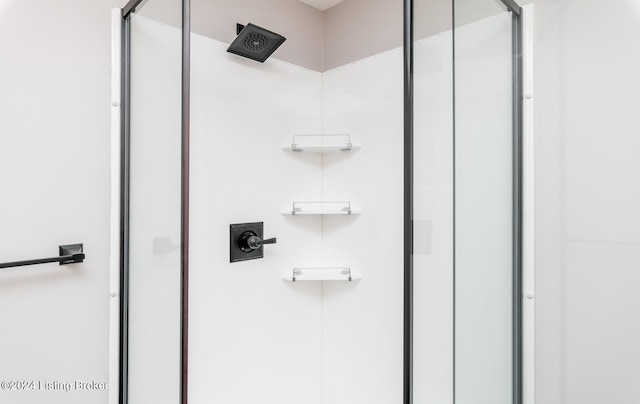 bathroom with an enclosed shower