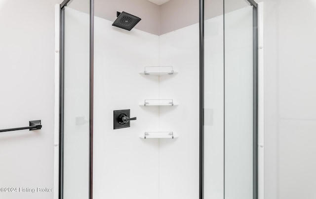 full bathroom with a shower with shower door