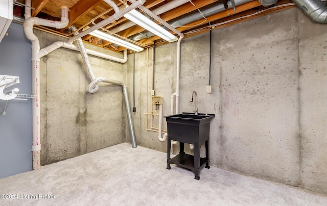 unfinished basement featuring carpet flooring