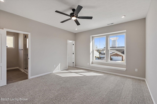 unfurnished bedroom featuring carpet floors and ceiling fan