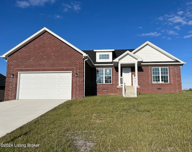 view of front of house with a garage and a front lawn