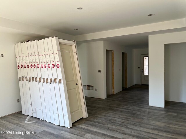 interior space with dark hardwood / wood-style flooring