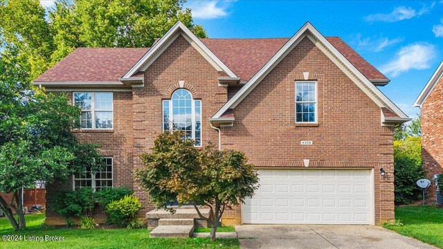 view of front property with a garage