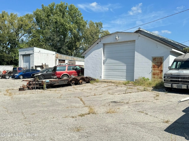 view of outbuilding with a garage