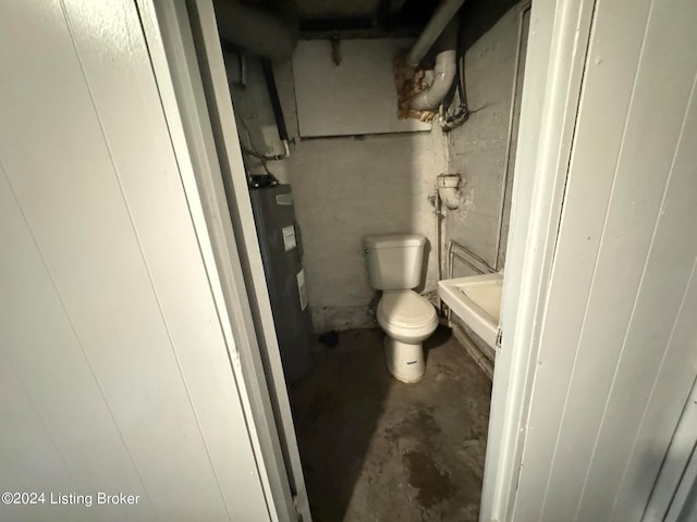 bathroom with toilet and water heater