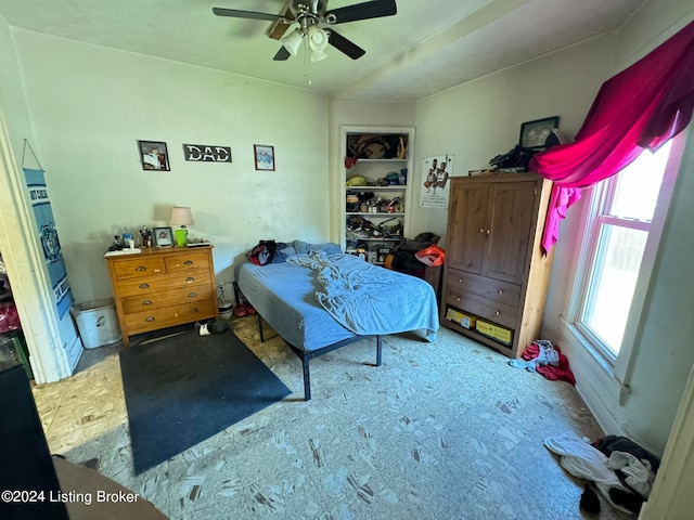 bedroom featuring ceiling fan