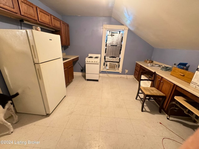 kitchen with white appliances, light tile patterned flooring, and lofted ceiling