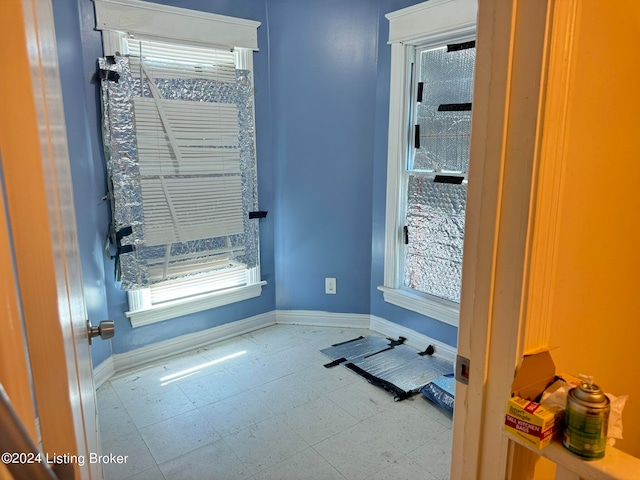 interior space featuring light tile patterned flooring