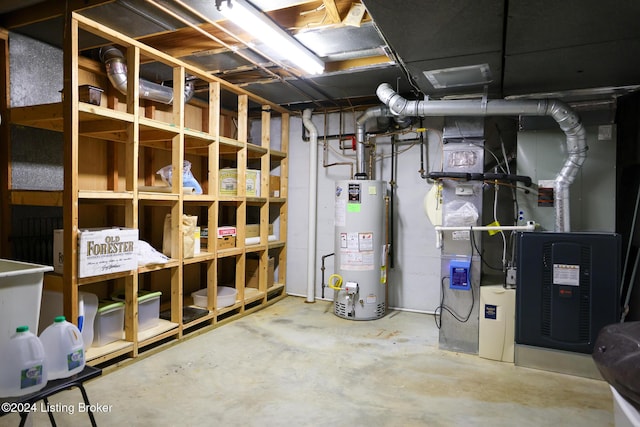 basement with gas water heater and heating unit