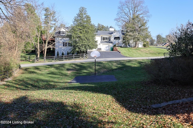 view of yard featuring a garage