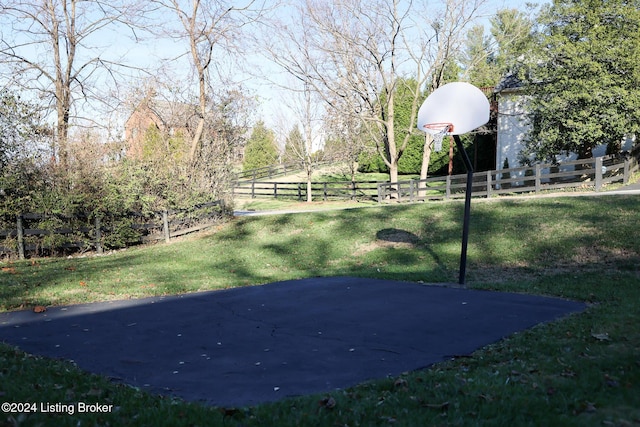 view of yard featuring basketball court