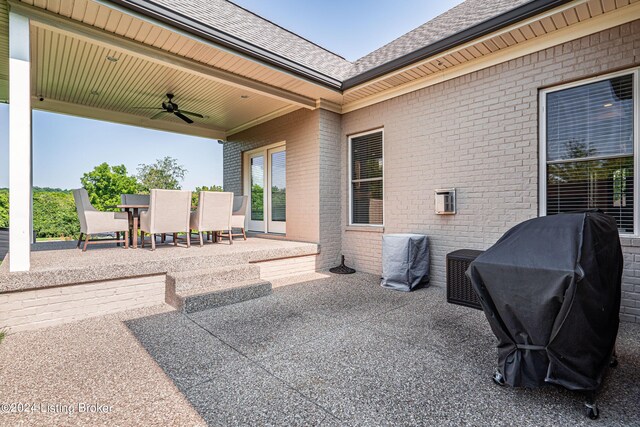 view of patio / terrace with ceiling fan and a grill